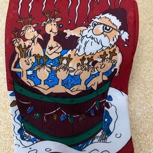 Santa Claus in the hot‎ tub with reindeer tie